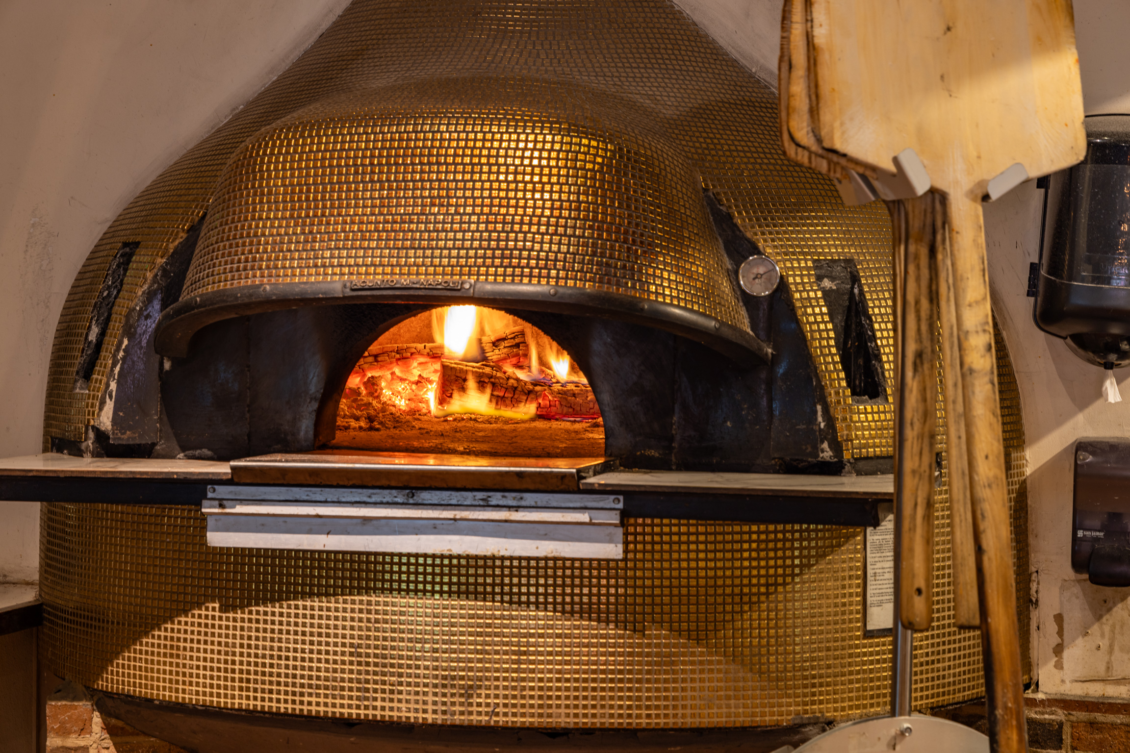 Wood-fired pizza oven at Amalfi
